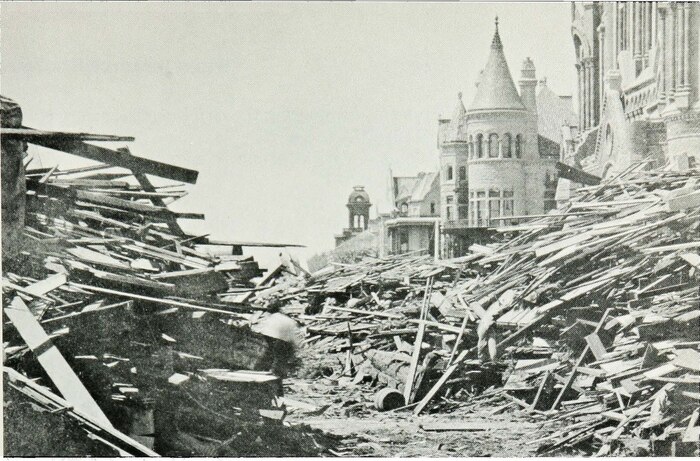 This historical photograph shows the aftermath of the Galveston Hurricane of 1900 from 13th Street and Broadway. 

The Great Storm of 1900 pummeled a defenseless island coastline with a 15 ft. tide and winds that reached an estimated 120 mph. In the aftermath, roughly 8,000 lives were lost and the remains of more than 3,600 homes lay scattered along the city. To date, it is the deadliest natural disaster in U.S. history.