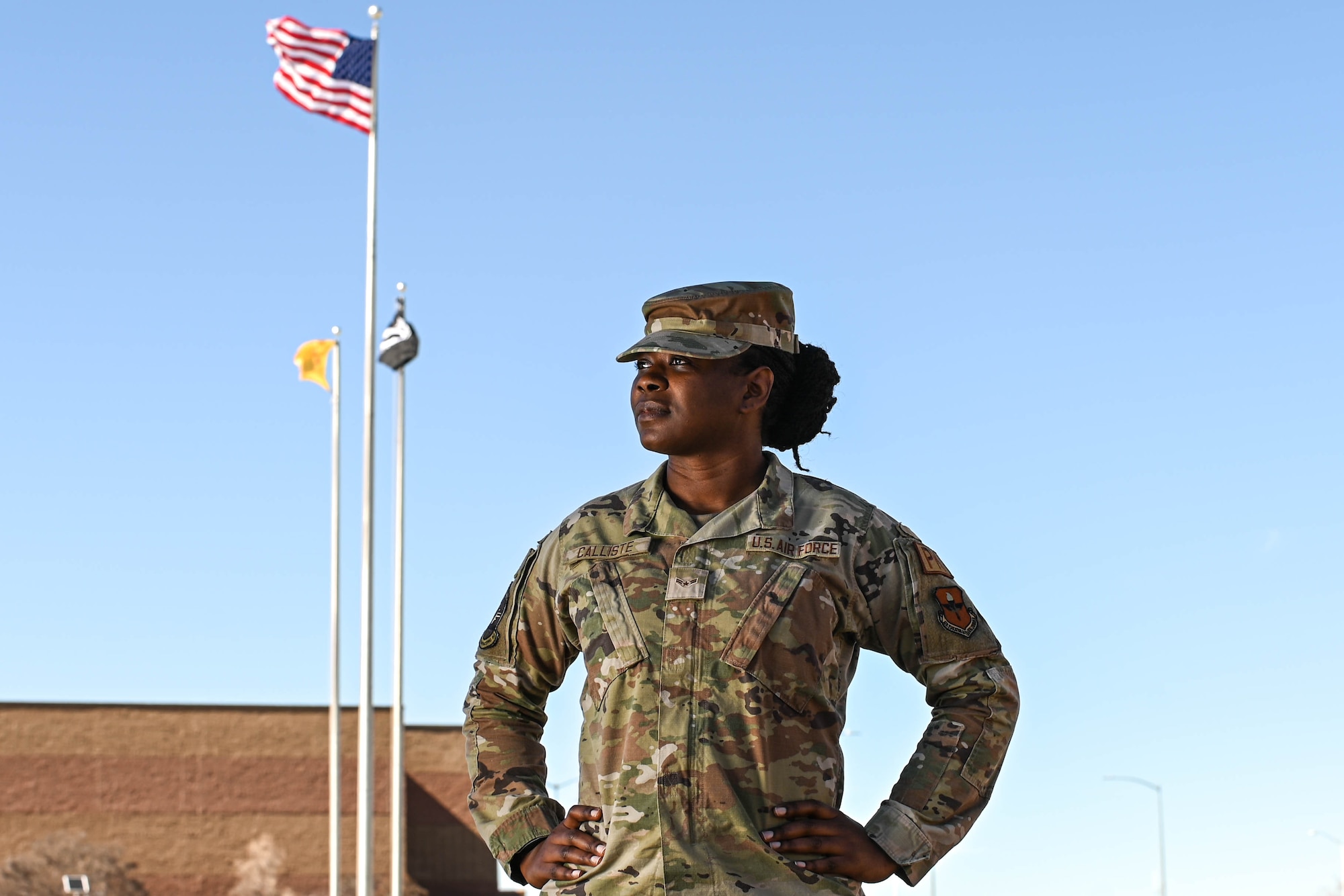 Caption: U.S. Air Force Airman 1st Class Nika Calliste, 49th Contracting Squadron contracting specialist, poses for a photo at Holloman Air Force Base, New Mexico, Feb. 22, 2024. Calliste was raised in the island nation of Grenada, she emigrated to the United States on Nov. 18, 2011, then she would eventually join the U.S. Air Force on Jan. 3, 2023. (U.S. Air Force photo by Airman 1st Class Isaiah Pedrazzini)