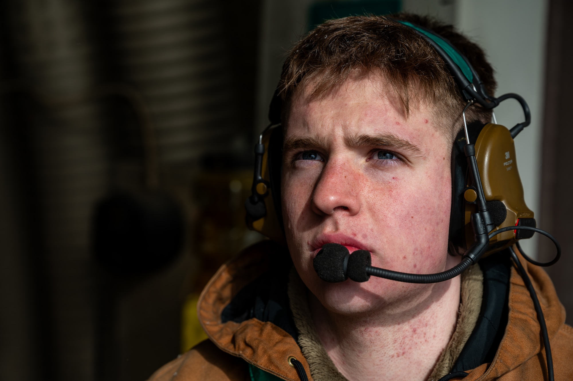 U.S. Air Force Airman 1st Class Tucker Arnold, 25th Fighter Generation Squadron crew chief, waits for an A-10C Thunderbolt II to turn on its engine at Osan Air Base, Republic of Korea, Jan. 22, 2024. Arnold works as a crew chief, which is a job that is within airframe, powerplant and general from the 25th FGS. APG ensures that the aircraft are mission capable for flight by maintaining and inspecting many different functioning components of the aircraft. (U.S. Air Force photo by Airman 1st Class Chase Verzaal)