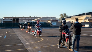 Luke Air Force Base motorcycle course students ride on a newly reconstructed training range during a motorcycle safety course hosted by 56th Fighter Wing Occupational Safety team, Feb. 16, 2024, at Luke Air Force Base, Arizona.