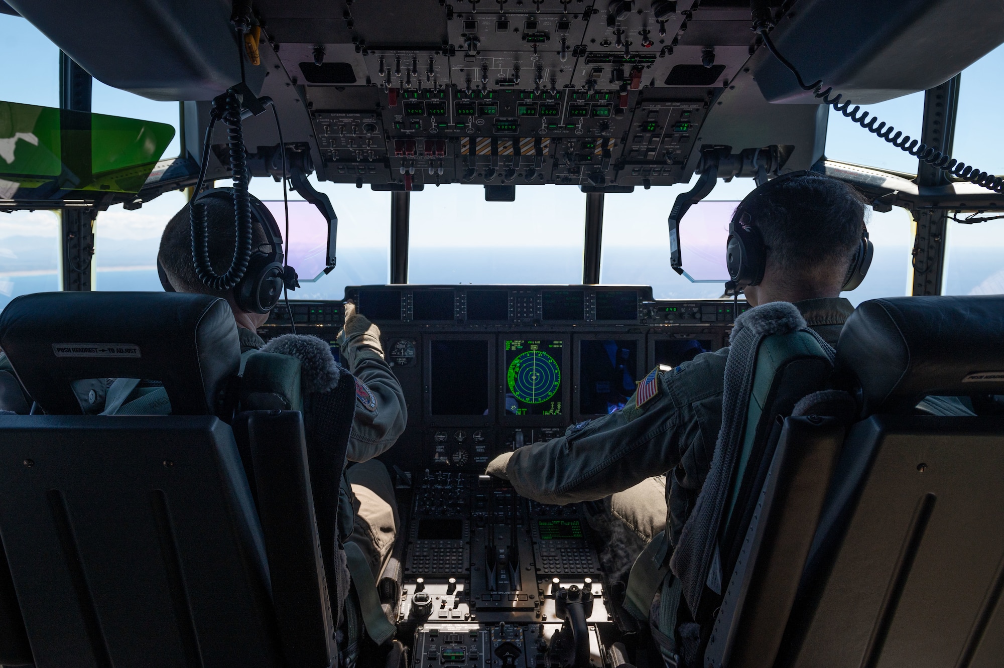 Pilots fly an MC-130J Commando