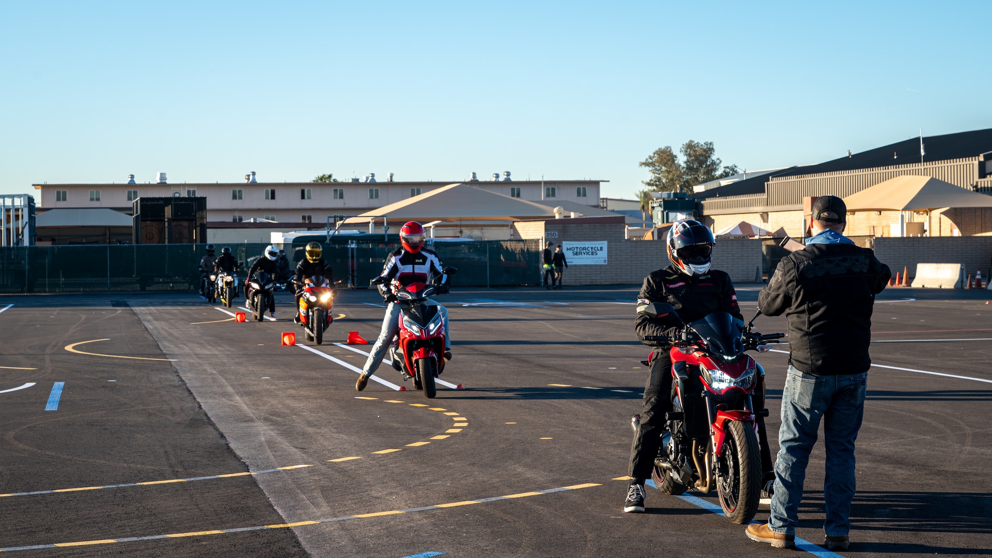 Luke Air Force Base motorcycle course students ride on a newly reconstructed training range during a motorcycle safety course hosted by 56th Fighter Wing Occupational Safety team, Feb. 16, 2024, at Luke Air Force Base, Arizona.
