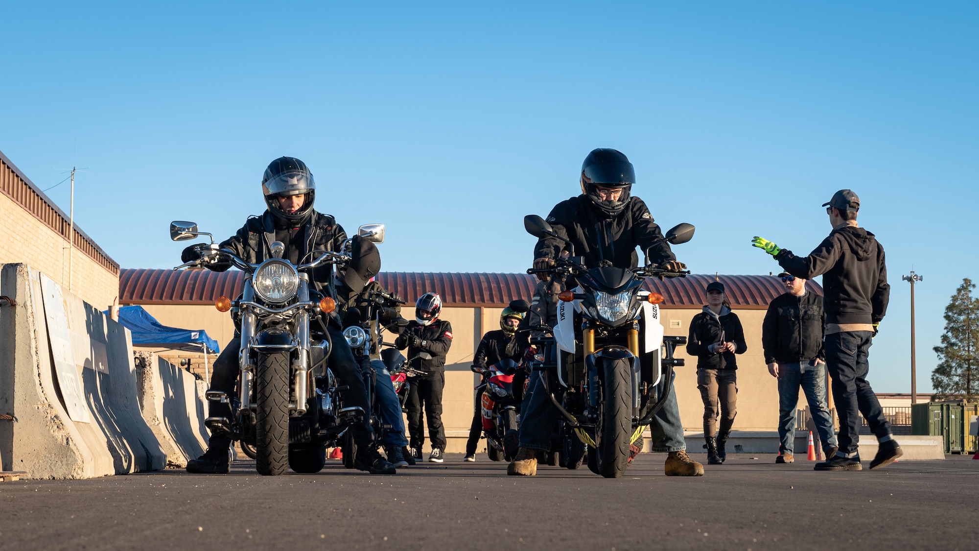 Tech. Sgt. Maximilian Wyckoff, rider coach, gives a briefing during a motorcycle safety course, Feb. 16, 2024, at Luke Air Force Base, Arizona.