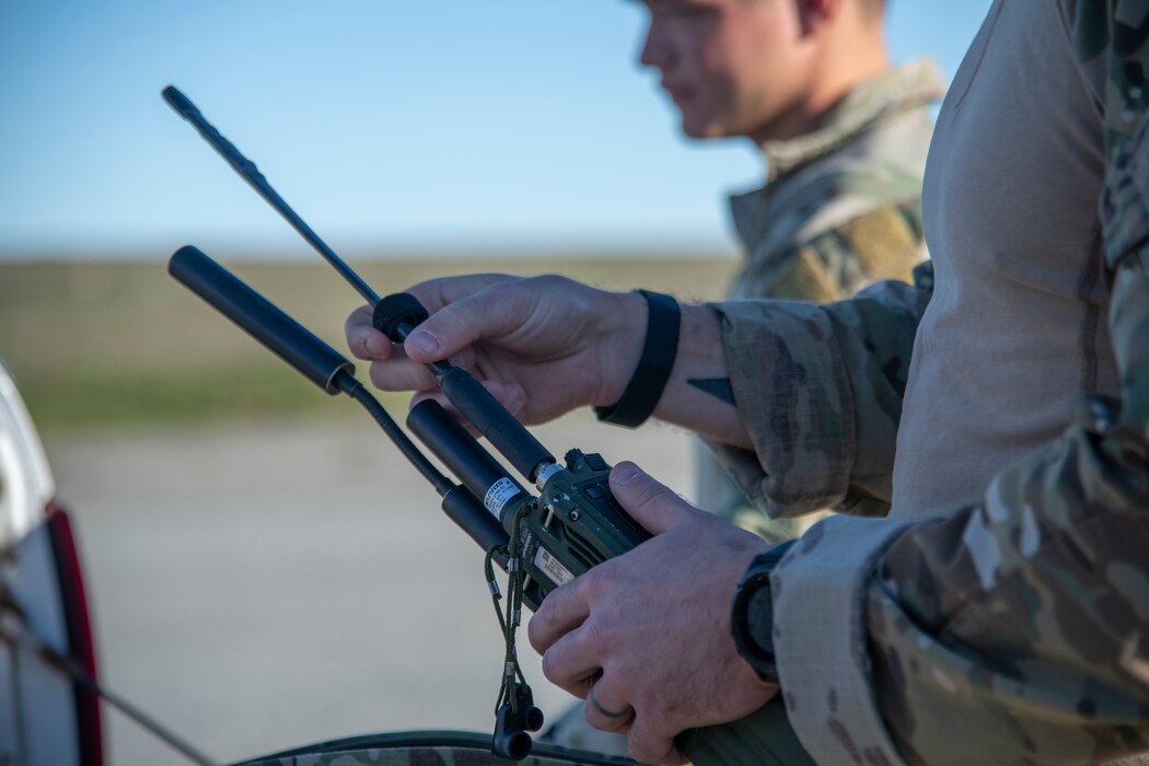 Airman sets up a radio