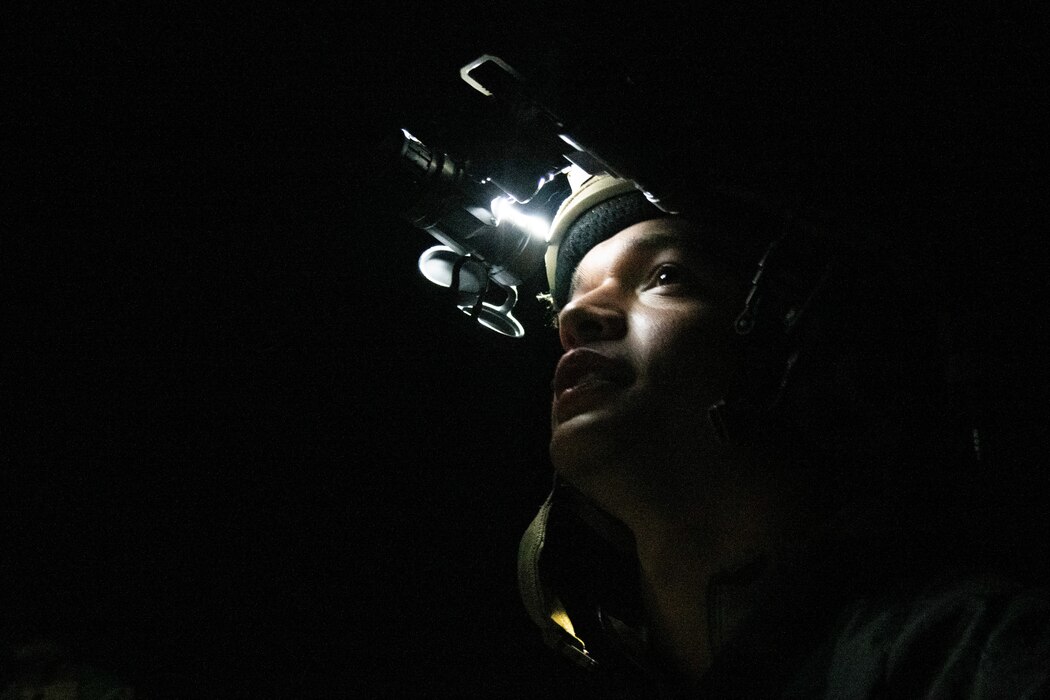 Airman wears helmet at night