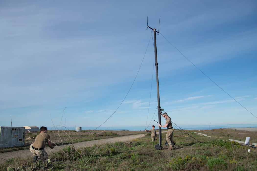 Airmen set up antenna