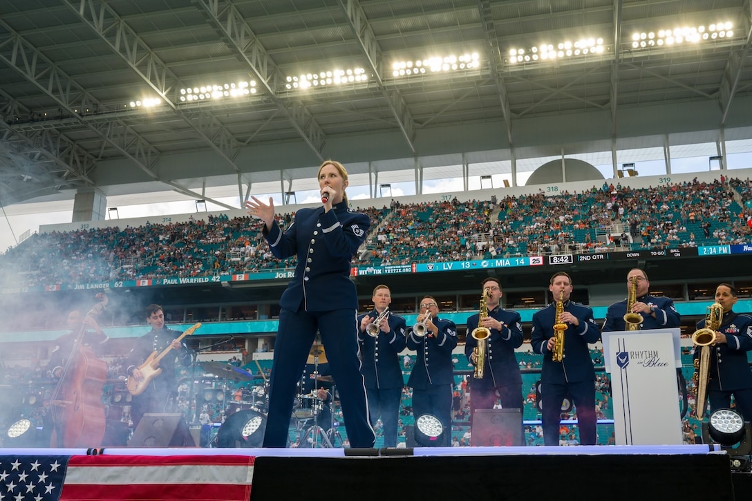 Rhythm in Blue jazz ensemble performs on stage during a halftime show at a Miami Dolphins game