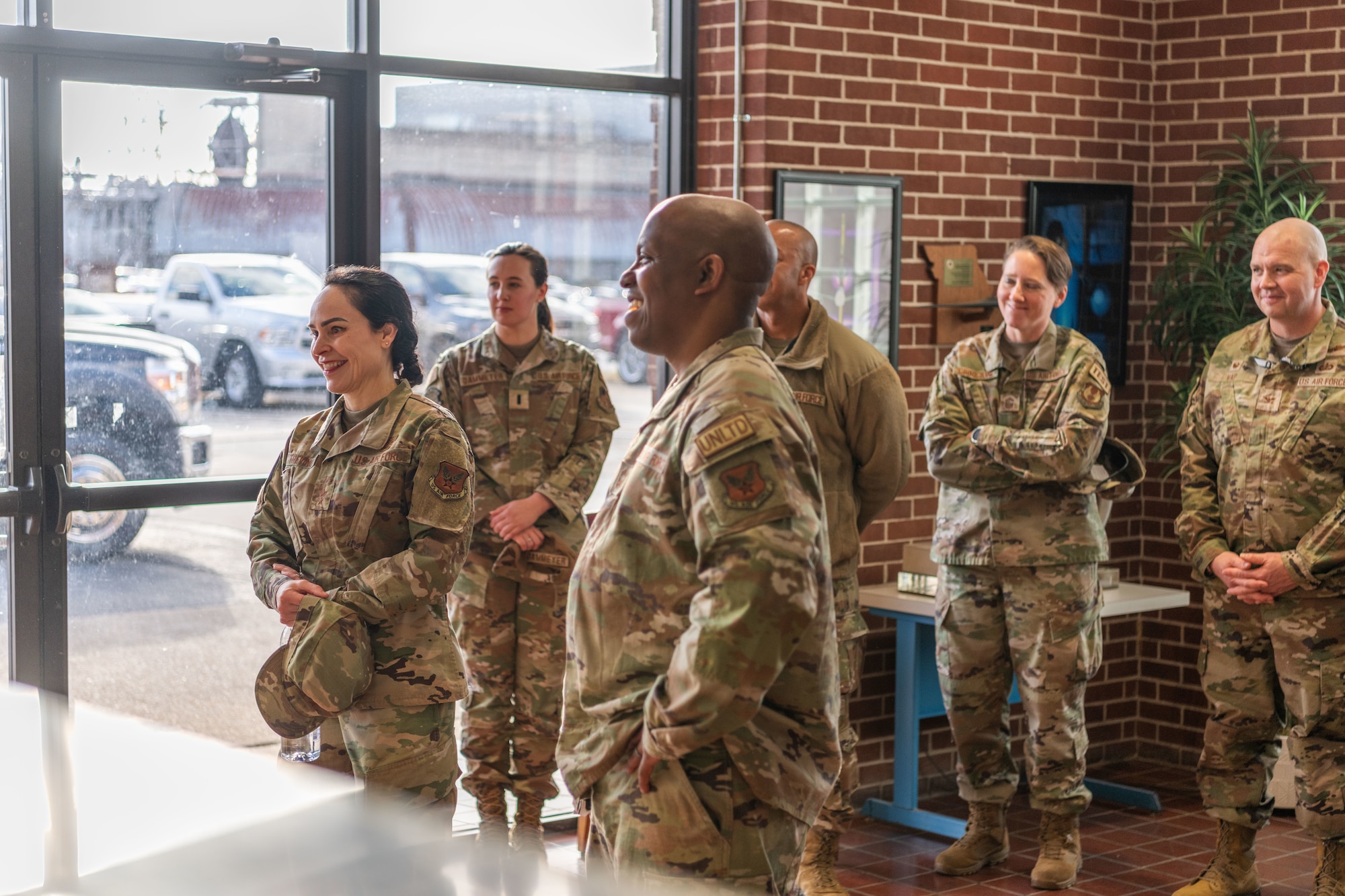 Maj. Gen. Alice Treviño, deputy assistant secretary for contracting with Office of the Assistant Secretary of the Air Force for Acquisition, Technology and Logistics, left, and Chief Master Sgt. Bryan Dubose, enlisted policy chief and career field manager, to Treviño’s left, listen as they are briefed on the capabilities of the 716th Test Squadron during their Dec. 5, 2023, visit to Arnold Air Force Base, Tenn, headquarters of Arnold Engineering Development Complex. Pictured in the background, from left, are 1st Lt. Camden Dammeyer, AEDC Commander Col. Randel Gordon, AEDC Senior Enlisted Leader Chief Master Sgt. Jennifer Cirricione and 804th Test Group Commander Col. Jason Vap. During her visit, Treviño met with members of the Arnold contracting team and toured several Arnold test facilities and sites on base where work is performed to support the test mission. (U.S. Air Force photo by Keith Thornburgh)
