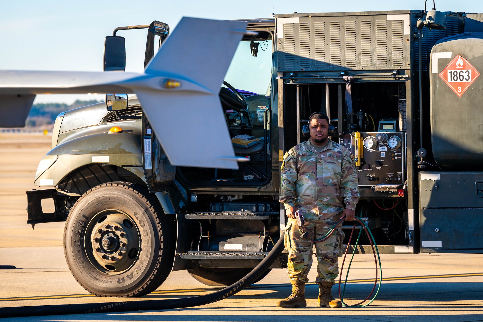 Man fueling aircraft.