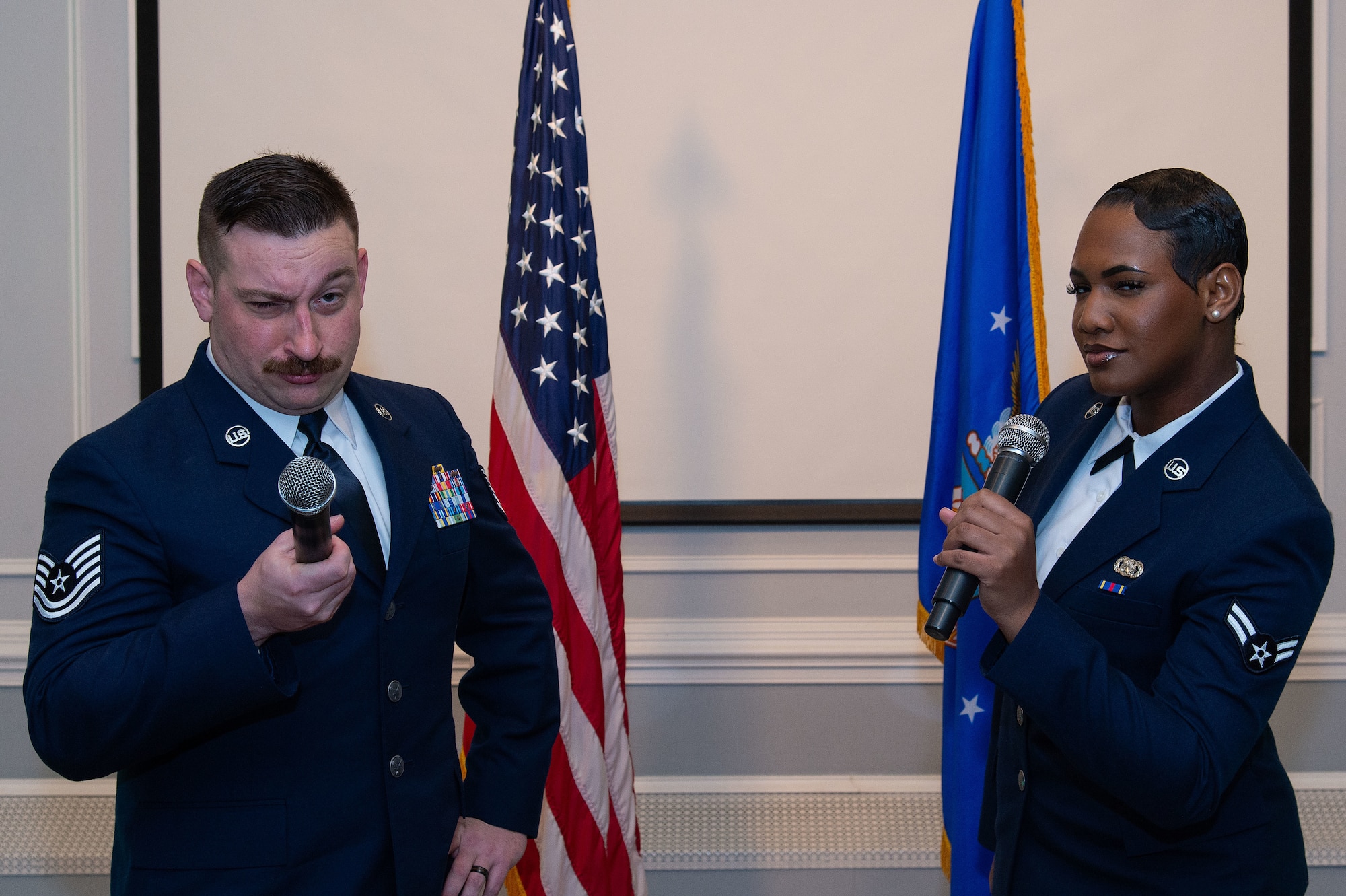U.S. Air Force Tech. Sgt. Michael Brockett, left, 436th Contracting Squadron contracting specialist, and U.S. Air Force Airman 1st Class Shanelle King, right, 436th Logistics Readiness Squadron ramp operations representative, pose for a photo at the 2023 436th Airlift Wing Annual Award Ceremony held at the Hartly Volunteer Fire Company in Hartly, Delaware, Feb. 23, 2024. More than 275 commanders, first sergeants, supervisors, family members and friends came out to support the 47 nominees and five teams competing in their respective categories. Brockett and King served as emcees for the event. (U.S. Air Force photo by Roland Balik)