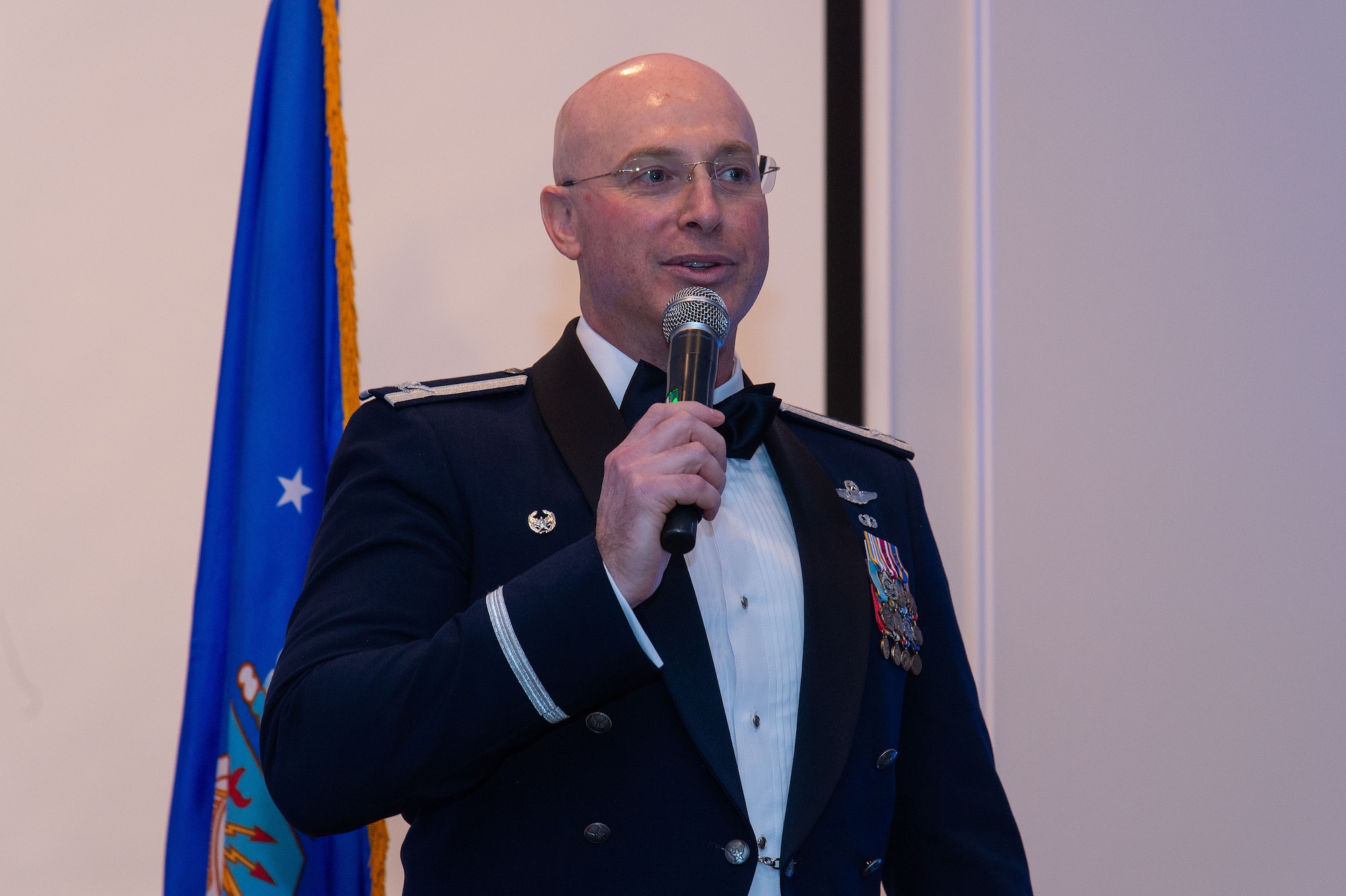 U.S. Air Force Col. Chris McDonald, left, 436th Airlift Wing commander, makes closing remarks at the 2023 436th AW Annual Awards Ceremony held at the Hartly Volunteer Fire Company in Hartly, Delaware, Feb. 23, 2024. Forty-seven Team Dover Airmen and five teams competed for recognition as ‘best-of-the-best’ in their respective categories. (U.S. Air Force photo by Roland Balik)