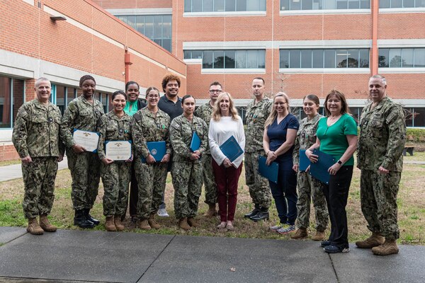 Sailors and civilians serving aboard Naval Health Clinic Cherry Point gathered Wednesday, February 28 to recognize the excellence and accomplishments of their peers.