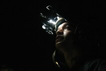 Airman wears helmet at night