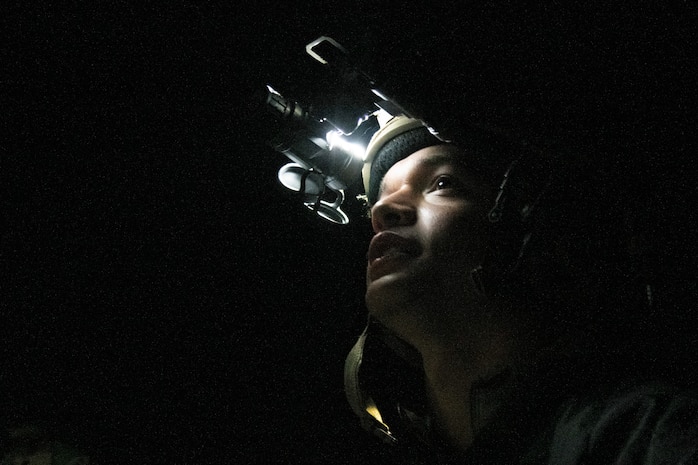 Airman wears helmet at night