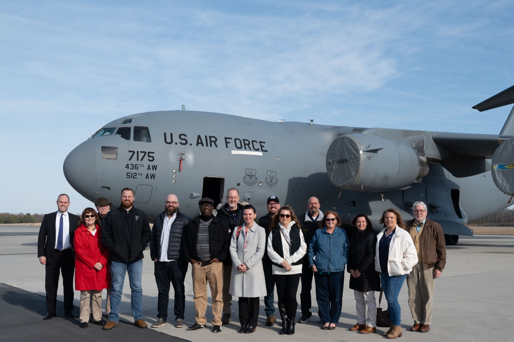 Team Dover honorary commanders pose for a photo in front of a C-17 Globemaster III during a tour of the 436th Operations Group at Dover Air Force Base, Delaware, Feb 22, 2024. During the tour, the honorary commanders visited various units within the OG and interacted with Airmen to learn more about each unit’s role in the Dover AFB mission. (U.S. Air Force photo by Airman 1st Class Dieondiere Jefferies)