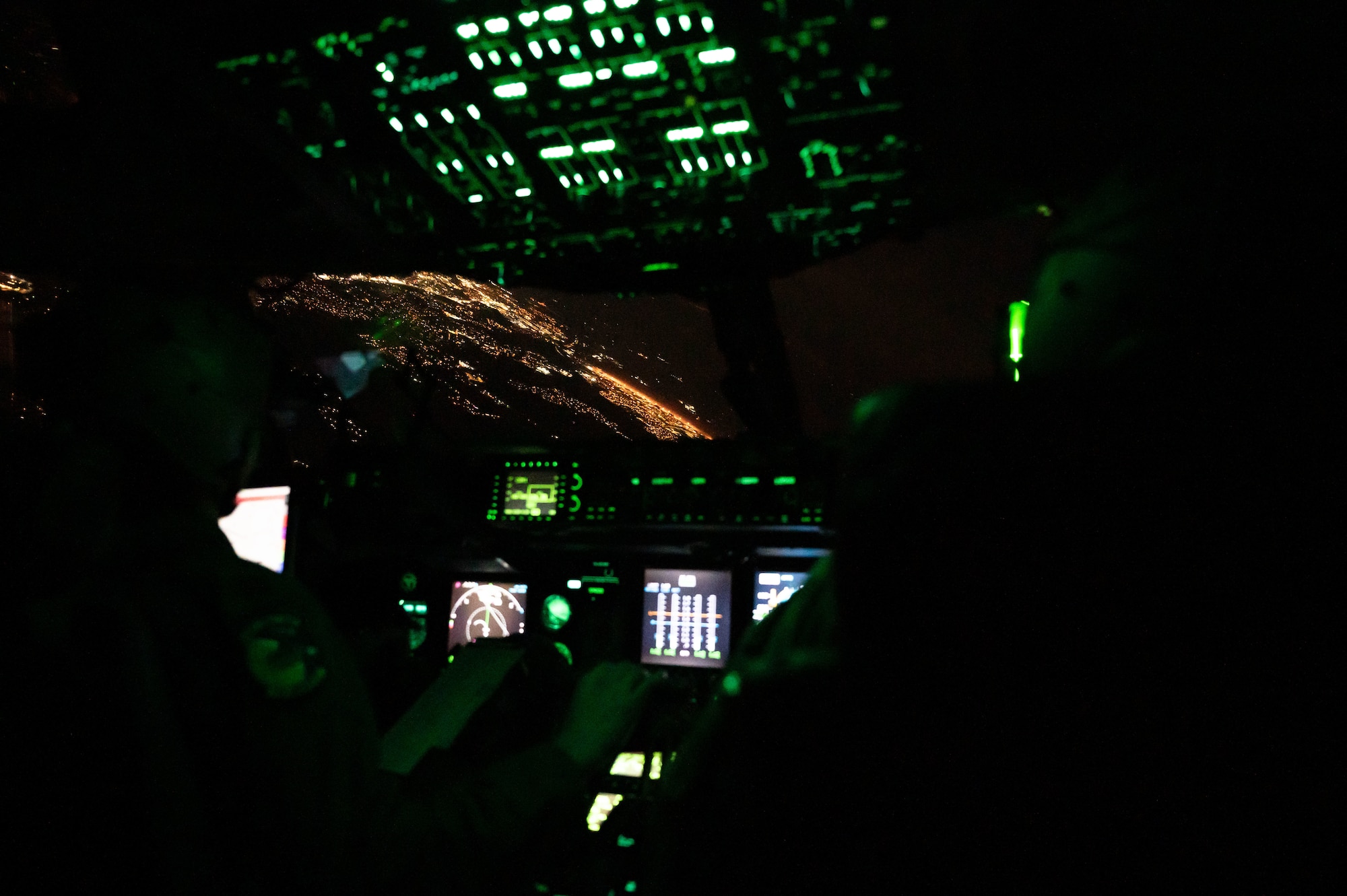A C-17 Globemaster III assigned to the 436th Airlift Wing conducts an inflight maneuver during a local evening training sortie over Delaware, Feb. 26, 2024. The 3rd Airlift Squadron conducted local training in preparation to support worldwide airlift capabilities to include clandestine delivery, extraction and airdrop of special operations forces and equipment. (U.S. Air Force photo by Airman 1st Class Amanda Jett)
