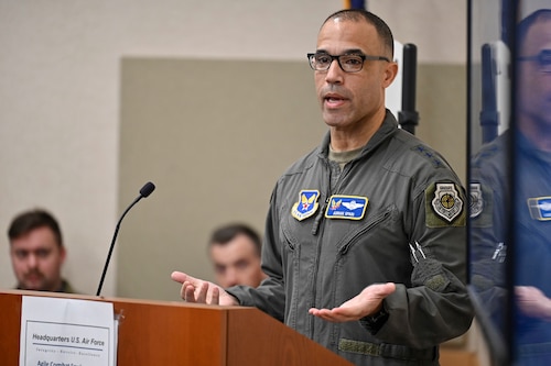 Attendees speak during the Agile Combat Employment Conference at the Pentagon