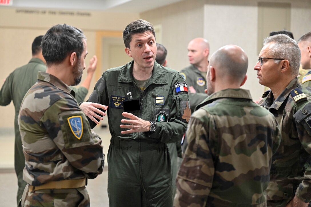 Attendees speak during the Agile Combat Employment Conference at the Pentagon