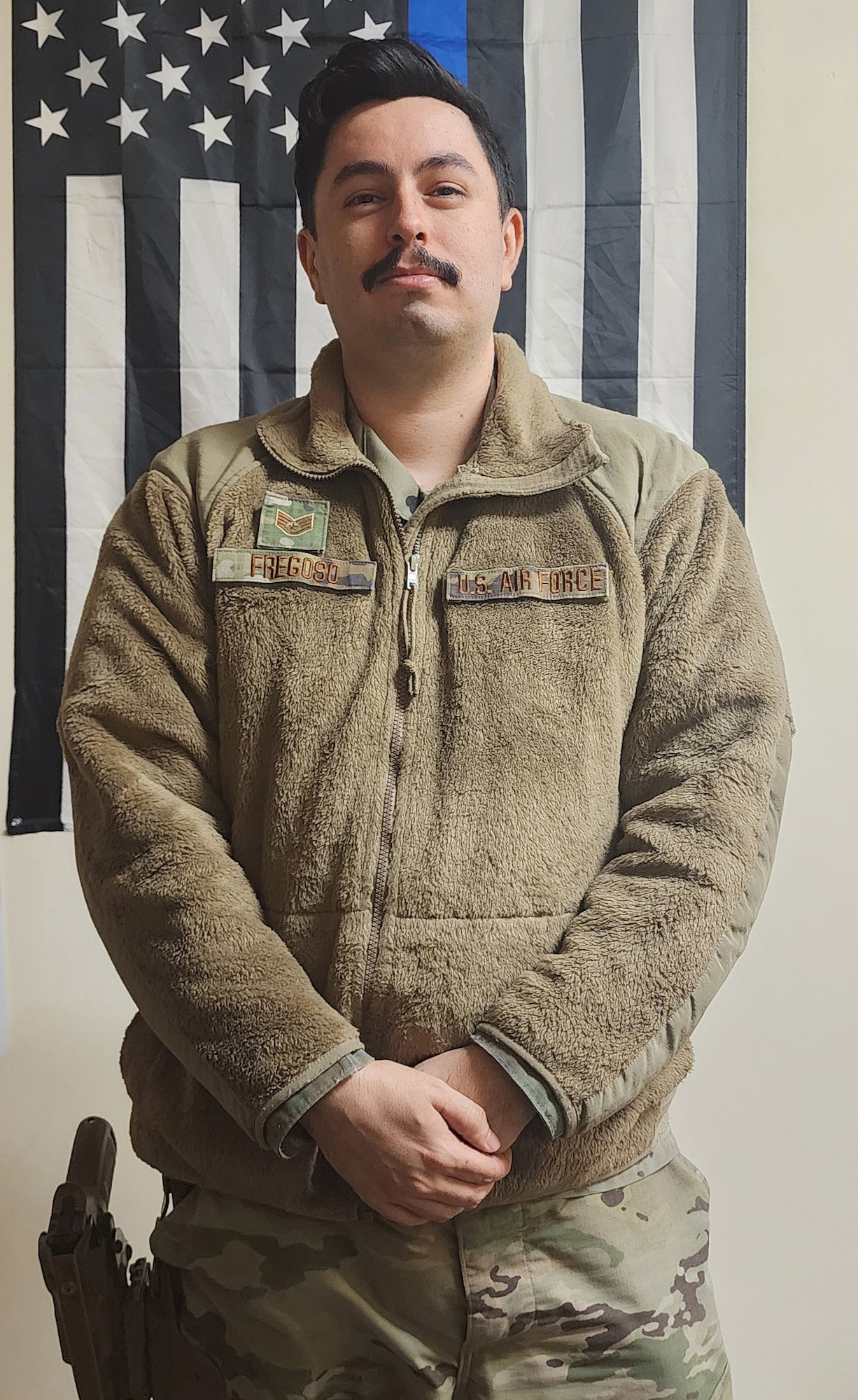 U.S. Air Force Staff Sgt. Erick Fregoso, 173rd Security Forces Squadron, poses for a picture before going on duty.