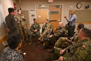 Attendees speak during the Agile Combat Employment Conference at the Pentagon