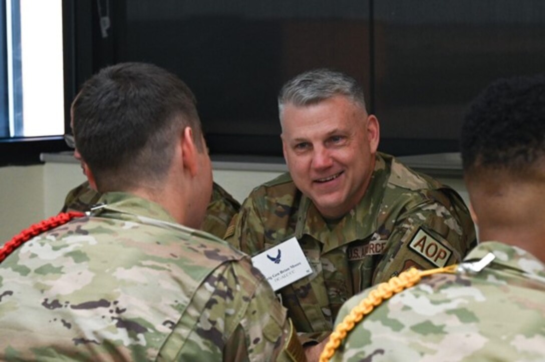 Brig. Gen. Brian Moore talks to airmen in training tudent leaders