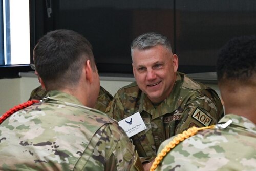 Brig. Gen. Brian Moore talks to airmen in training tudent leaders