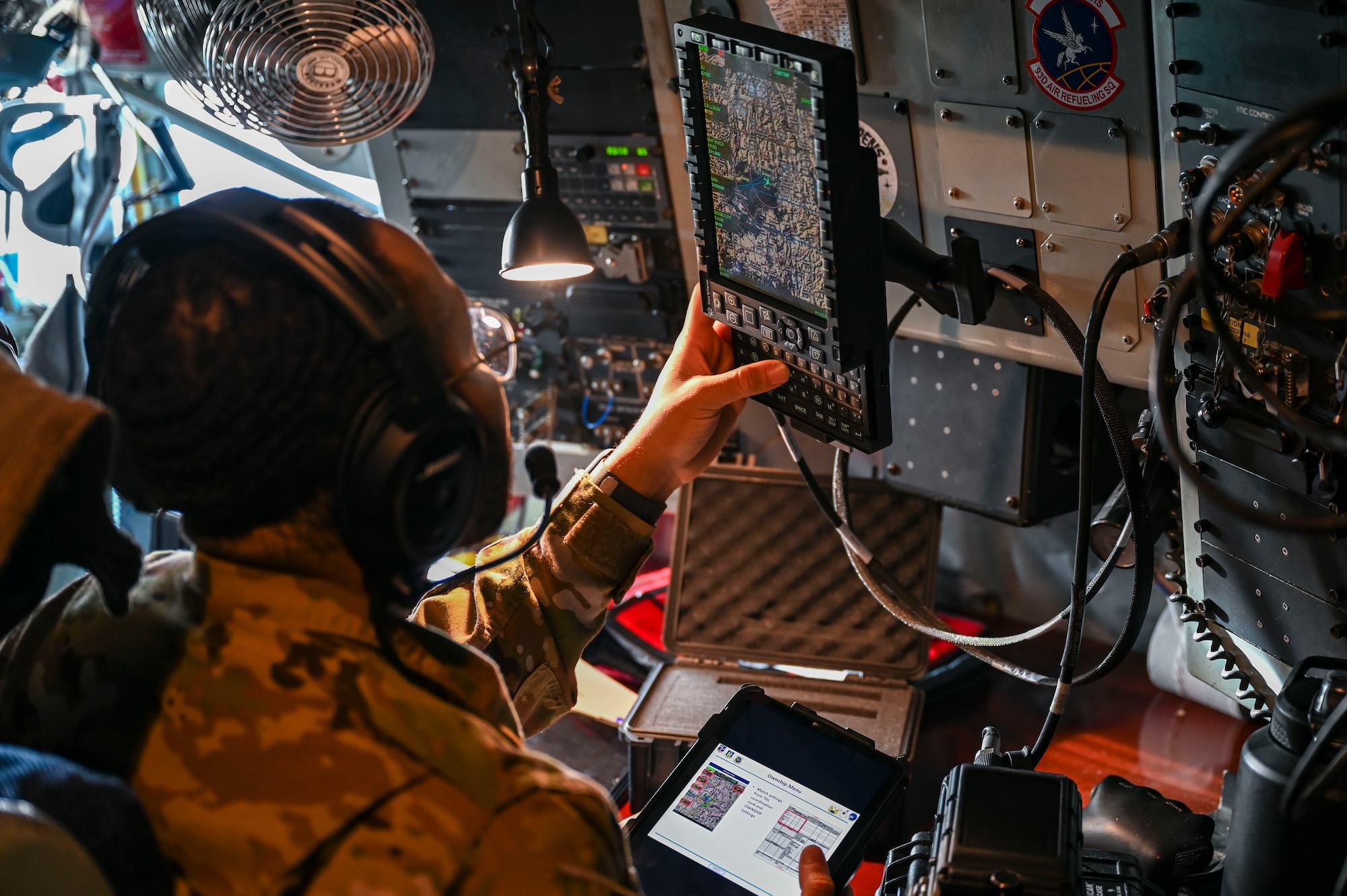An Airman trains on the Real-Time Information in the Cockpit system