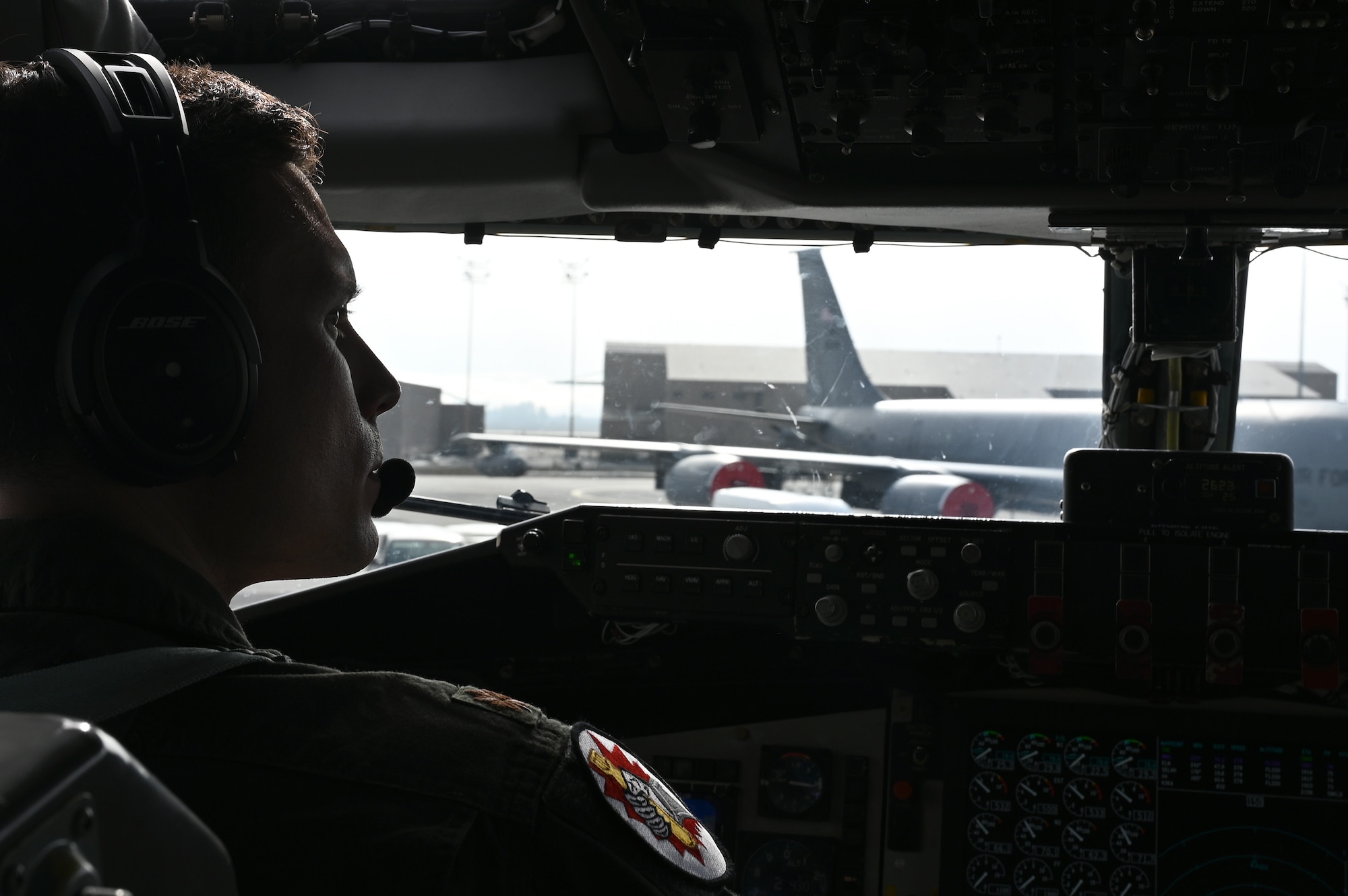 An Airman pilots a KC-135 Stratotanker