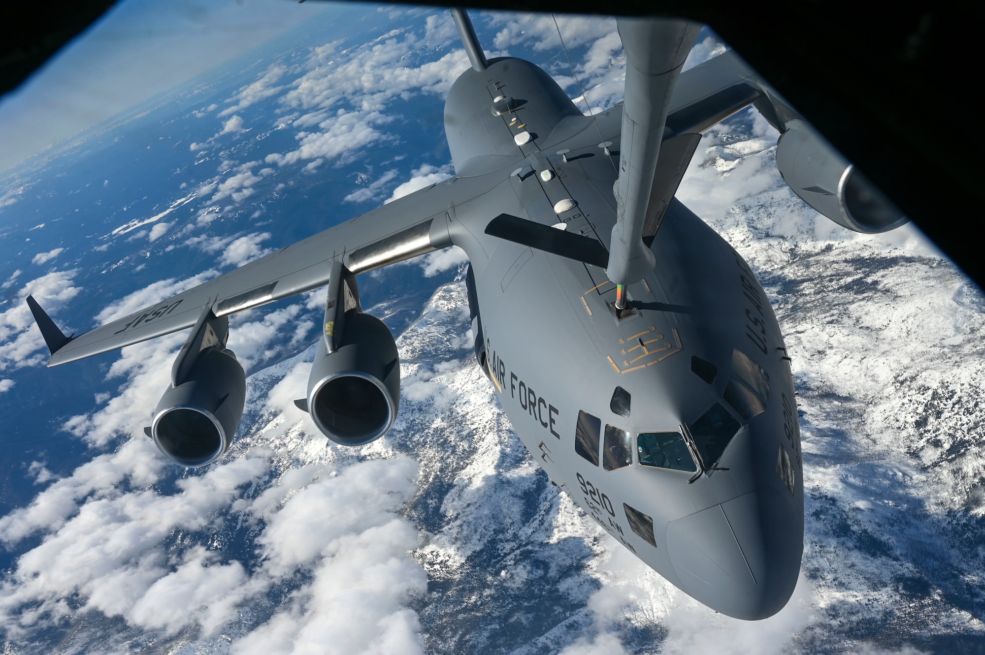 A C-17 receives aerial refueling