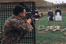 U.S. Marine Corps Sgt. Ceaser Verdin, a drill instructor with Support Training Battalion, Marine Corps Recruit Depot San Diego and a member of the Edson Range shooting team, engages a target during an action rifle stage at the Marine Corps Marksmanship Competition West at Marine Corps Base Camp Pendleton, California, Feb. 23, 2024. Verdin is a native of Pomona, California. The MCMC West was held in conjunction with several other competitions around the Marine Corps to find the top 10 percent of shooters who will go on to compete in the national tournament in Quantico, Virginia for a place on the Marine Corps Shooting Team. (U.S. Marine Corps photo by Cpl. Alexander O. Devereux)