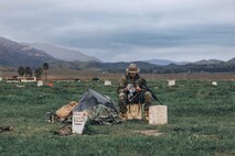 U.S. Marine Corps Gunnery Sgt. Elkan Meyer, the uniformed readiness coordinator and substance abuse control officer with 1st Recruit Training Battalion and a member of the Edson Range shooting team, cleans his rifle after an action rifle stage at the Marine Corps Marksmanship Competition West at Marine Corps Base Camp Pendleton, California, Feb. 23, 2024. Meyer is a native of Cary, Illinois. The MCMC West was held in conjunction with several other competitions around the Marine Corps to find the top 10 percent of shooters who will go on to compete in the national tournament in Quantico, Virginia for a place on the Marine Corps Shooting Team. (U.S. Marine Corps photo by Cpl. Alexander O. Devereux)