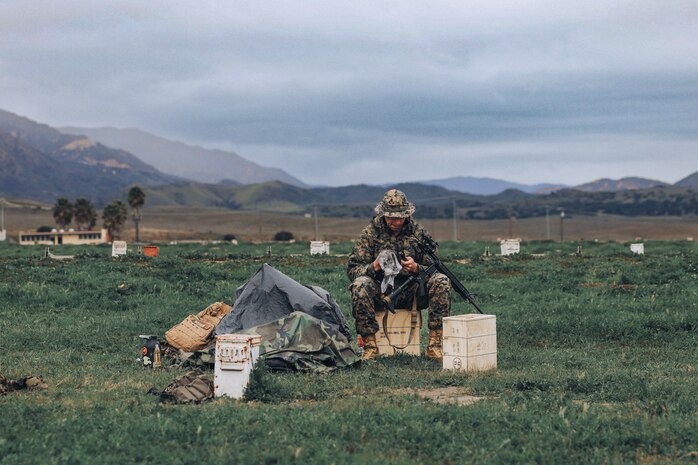 U.S. Marine Corps Gunnery Sgt. Elkan Meyer, the uniformed readiness coordinator and substance abuse control officer with 1st Recruit Training Battalion and a member of the Edson Range shooting team, cleans his rifle after an action rifle stage at the Marine Corps Marksmanship Competition West at Marine Corps Base Camp Pendleton, California, Feb. 23, 2024. Meyer is a native of Cary, Illinois. The MCMC West was held in conjunction with several other competitions around the Marine Corps to find the top 10 percent of shooters who will go on to compete in the national tournament in Quantico, Virginia for a place on the Marine Corps Shooting Team. (U.S. Marine Corps photo by Cpl. Alexander O. Devereux)