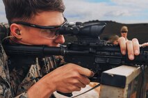 U.S. Marine Corps Cpl. Caymen Malay, armory maintenance chief with the Provost Marshals Office, Marine Corps Recruit Depot San Diego, and a member of the Edson Range shooting team, engages ‘unknown distance’ targets during a long-bay rifle stage at the Marine Corps Marksmanship Competition West at Marine Corps Base Camp Pendleton, California, Feb. 23, 2024. Malay is a native of Las Vegas, Nevada. The MCMC West was held in conjunction with several other competitions around the Marine Corps to find the top 10 percent of shooters who will go on to compete in the national tournament in Quantico, Virginia for a place on the Marine Corps Shooting Team. (U.S. Marine Corps photo by Cpl. Alexander O. Devereux)