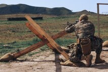 U.S. Marine Corps Staff Sgt. Loren Smith, chief academic instructor, Support Training Battalion, Marine Corps Recruit Depot San Diego and a member of the Edson Range shooting team, engages ‘unknown distance’ targets during a long-bay rifle stage at the Marine Corps Marksmanship Competition West at Marine Corps Base Camp Pendleton, California, Feb. 23, 2024. Smith is a native of Cascade, Idaho. The MCMC West was held in conjunction with several other competitions around the Marine Corps to find the top 10 percent of shooters who will go on to compete in the national tournament in Quantico, Virginia for a place on the Marine Corps Shooting Team. (U.S. Marine Corps photo by Cpl. Alexander O. Devereux).
