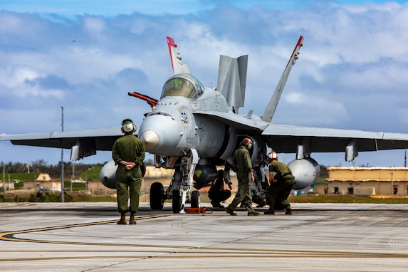 U.S. Marines with Marine Fighter Attack Squadron (VMFA) 232 performs preflight inspections on an F/A-18C Hornet aircraft at Andersen Air Force Base, Guam, Jan. 30, 2024. Nicknamed the “Red Devils,” VMFA-232 traveled from Marine Corps Air Station Iwakuni, Japan to Guam as a part of their Aviation Training Relocation Program deployment to train multilaterally with allies and partners, and enhance the squadron’s combat readiness. (U.S. Marine Corps photo by Lance Cpl. David Getz)
