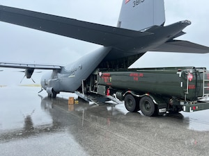 C-130J aircraft loading fuel truck