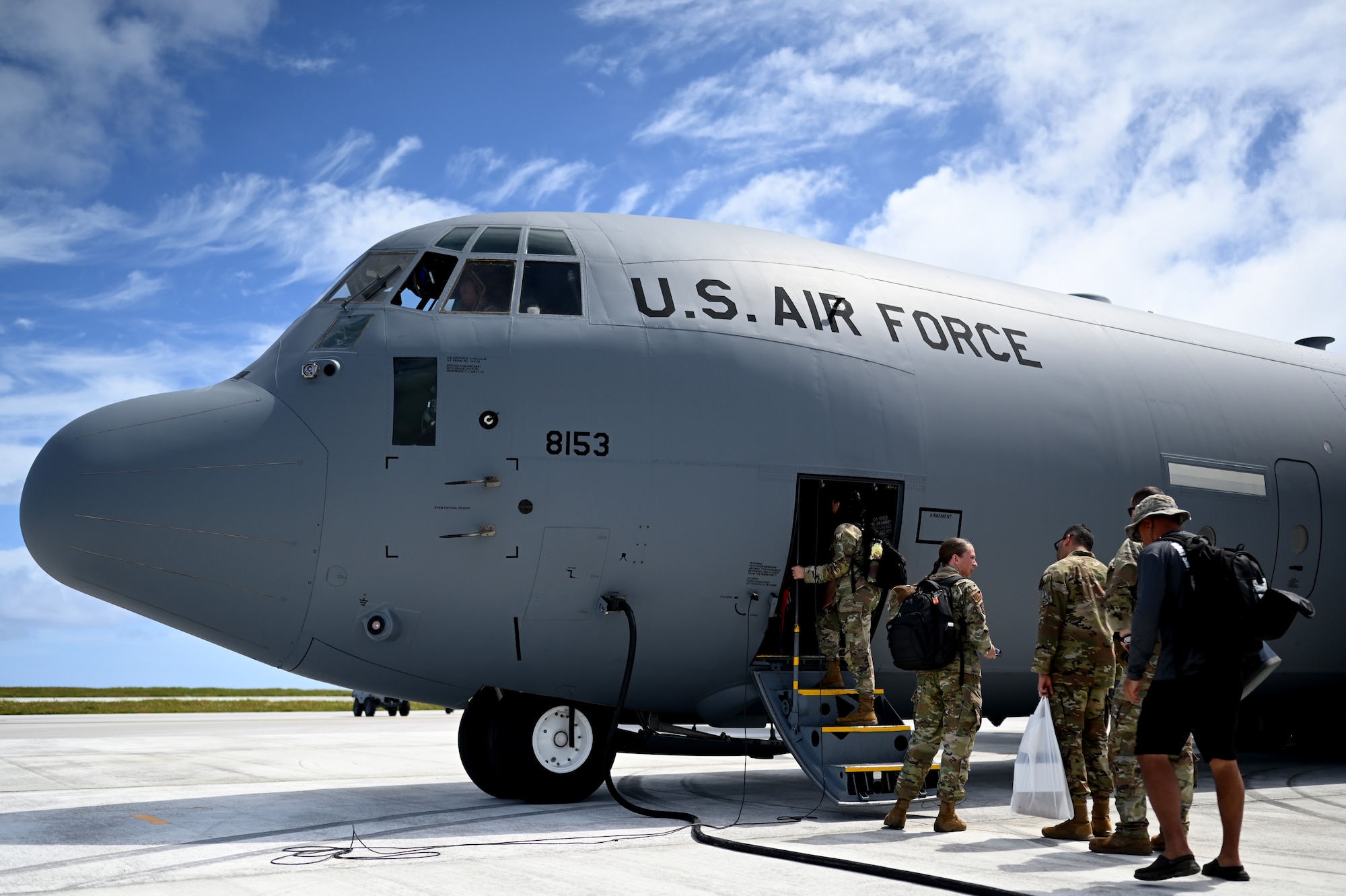 Airmen boarding C-130J