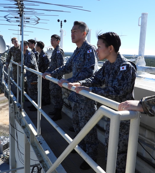  Operators from the Japanese Air Self-Defense Force, Space Operations Group, 1st Space Operations Squadron, look out from U.S. Space Force’s Space Delta 2 – Space Domain Awareness and Space Battle Management’s 20th Space Surveillance Squadron’s AN/FPS-85 Phased Array Radar catwalk at Eglin Air Force Base, Florida, Jan. 30, 2024. Eglin AFB served as the first stop of a two-part visit for 1 SOPS operators and included an unclassified mission brief for the Delta’s AN/FPS-85 Phased Array Radar and observed a demonstration of the radar simulator. (U.S. Space Force Photo by 1st Lt Thomas Haskell)