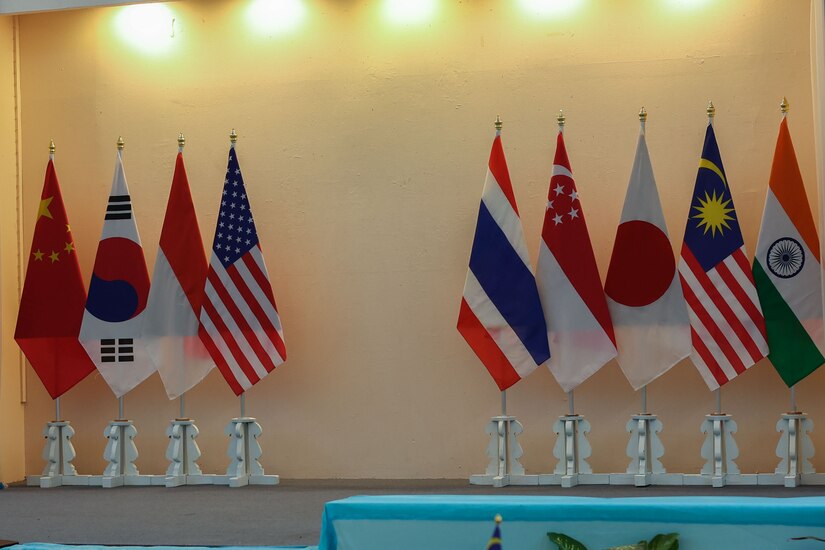 Flags from nine participating nations are displayed at a humanitarian assistance disaster relief (HADR) table-top exercise during Cobra Gold 24 in Chonburi Province, Kingdom of Thailand, Feb. 20, 2024.
