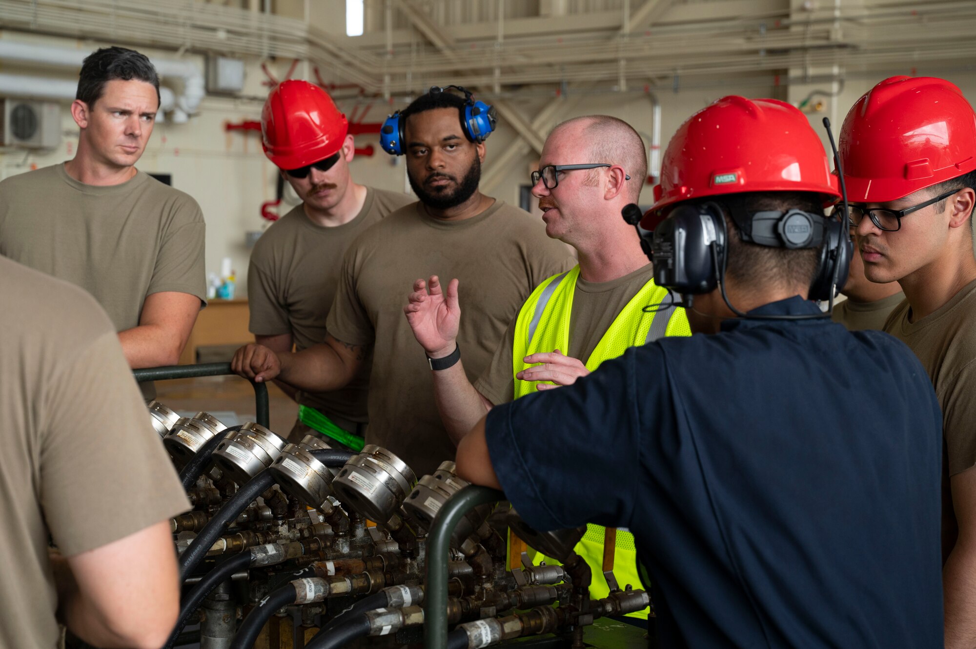 U.S. Air Force Airmen with the 36th Maintenance Squadron prepare to lift an A310 aircraft using low pressure heavy aircraft lifting bags on Andersen Air Force Base, Guam, Feb. 22, 2024. The Airmen had to lift the aircraft so that contractors could use an excavator to demolish it due to unrepairable damages. (U.S. Air Force Photo by Airman 1st Class Spencer Perkins)