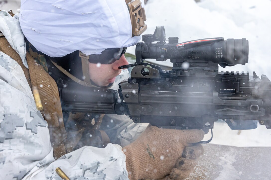 A U.S. Marine with Combat Logistics Battalion 6, Combat Logistics Regiment 2, 2nd Marine Logistics Group, fires a M249 machine gun during a machine gun range in Setermoen, Norway, Feb. 21, 2024. CLB-6 is in Norway apart of Marine Rotational Forces Europe 24.1 which focuses on regional engagements throughout Europe by conducting various exercises, arctic cold-weather and mountain warfare training, and military-to-military engagements, which enhance overall interoperability of the U.S. Marine Corps with allies and partners. (U.S. Marine Corps photo by Lance Cpl. Christian Salazar)