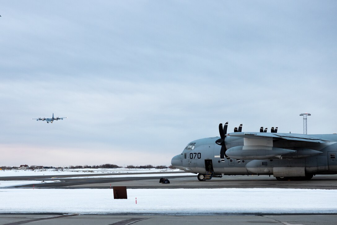 Two U.S. Marine Corps KC-130J Super Hercules aircraft, both assigned to Marine Aerial Refueler Transport Squadron (VMGR) 252, 2nd Marine Aircraft Wing, arrive in preparation for Exercise Nordic Response 24 at Andenes, Norway, Feb. 25, 2024. Exercise Nordic Response, formerly known as Cold Response, is a NATO training event conducted every two years to promote military competency in arctic environments and to foster interoperability between the U.S. Marine Corps and allied nations. (U.S. Marine Corps photo by Cpl. Christopher Hernandez)