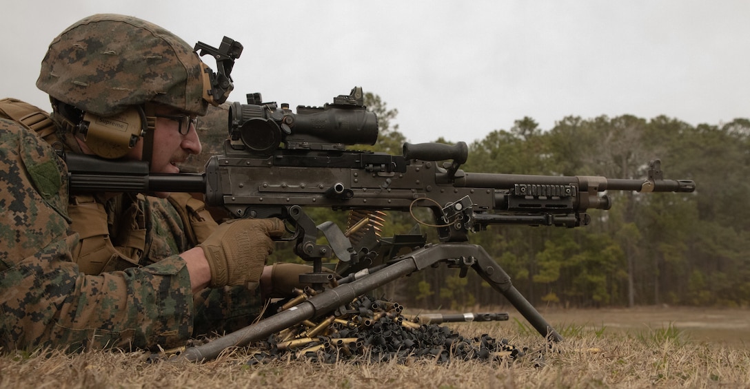 A U.S. Marine with Romeo Battery, Battalion Landing Team 1/8, 24th Marine Expeditionary Unit, fires a M240 machine gun during a weapons familiarization range on Camp Lejeune, North Carolina, Feb. 27, 2024. The 24th MEU is a premier crisis response force capable of deploying and landing at a moment’s notice. The skilled 24th MEU Marines and Sailors who comprise the flexible sea-based Marine Air Ground Task Force are ready to answer the Nation’s call to crisis, no matter the clime or place. (U.S. Marine Corps photo by Cpl. Aydan Millette)