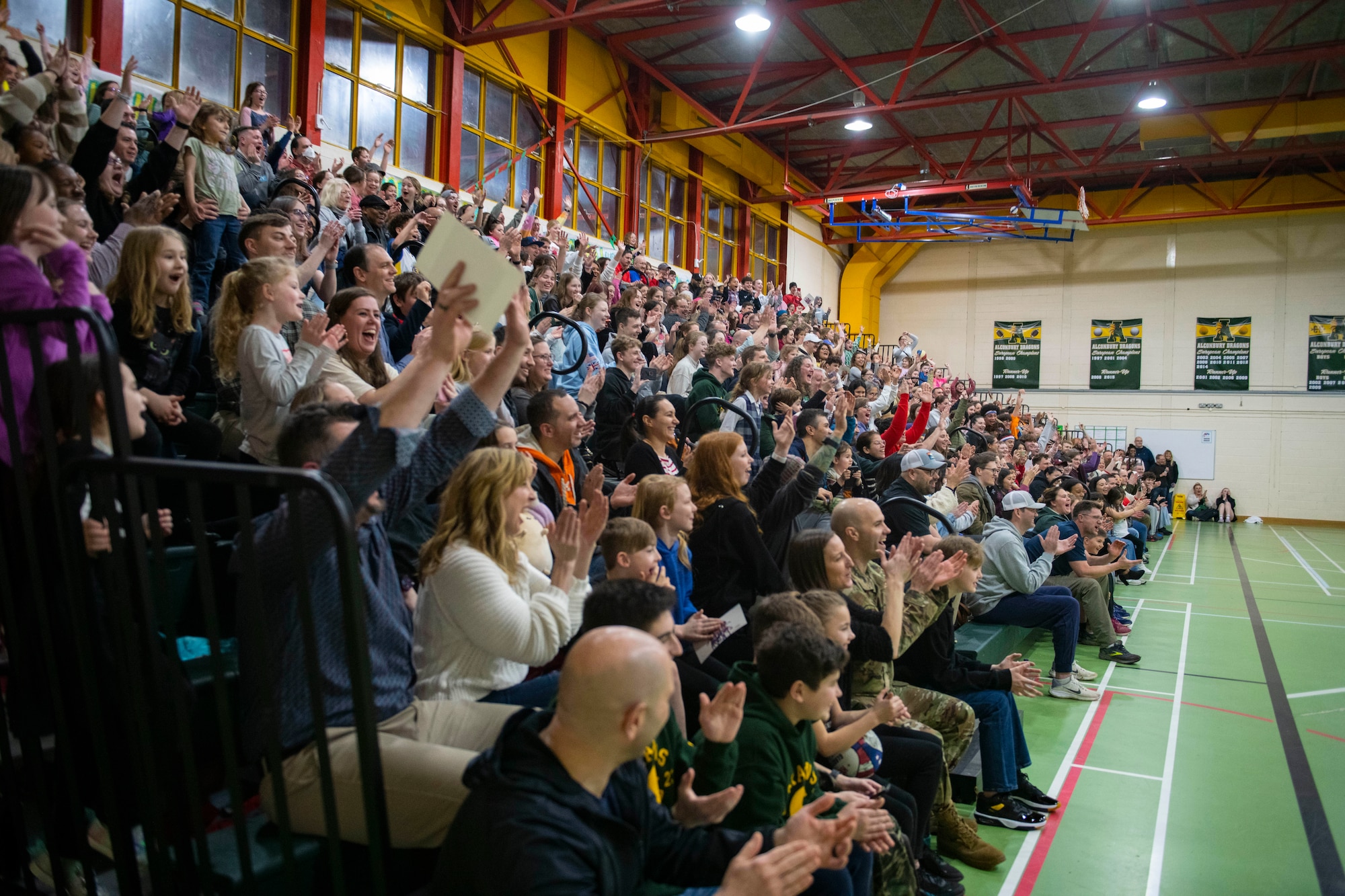 The crowd cheers during a performance by the Harlem Globetrotters at RAF Alconbury