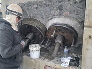 Grout plates at the base of gudgeon rods.