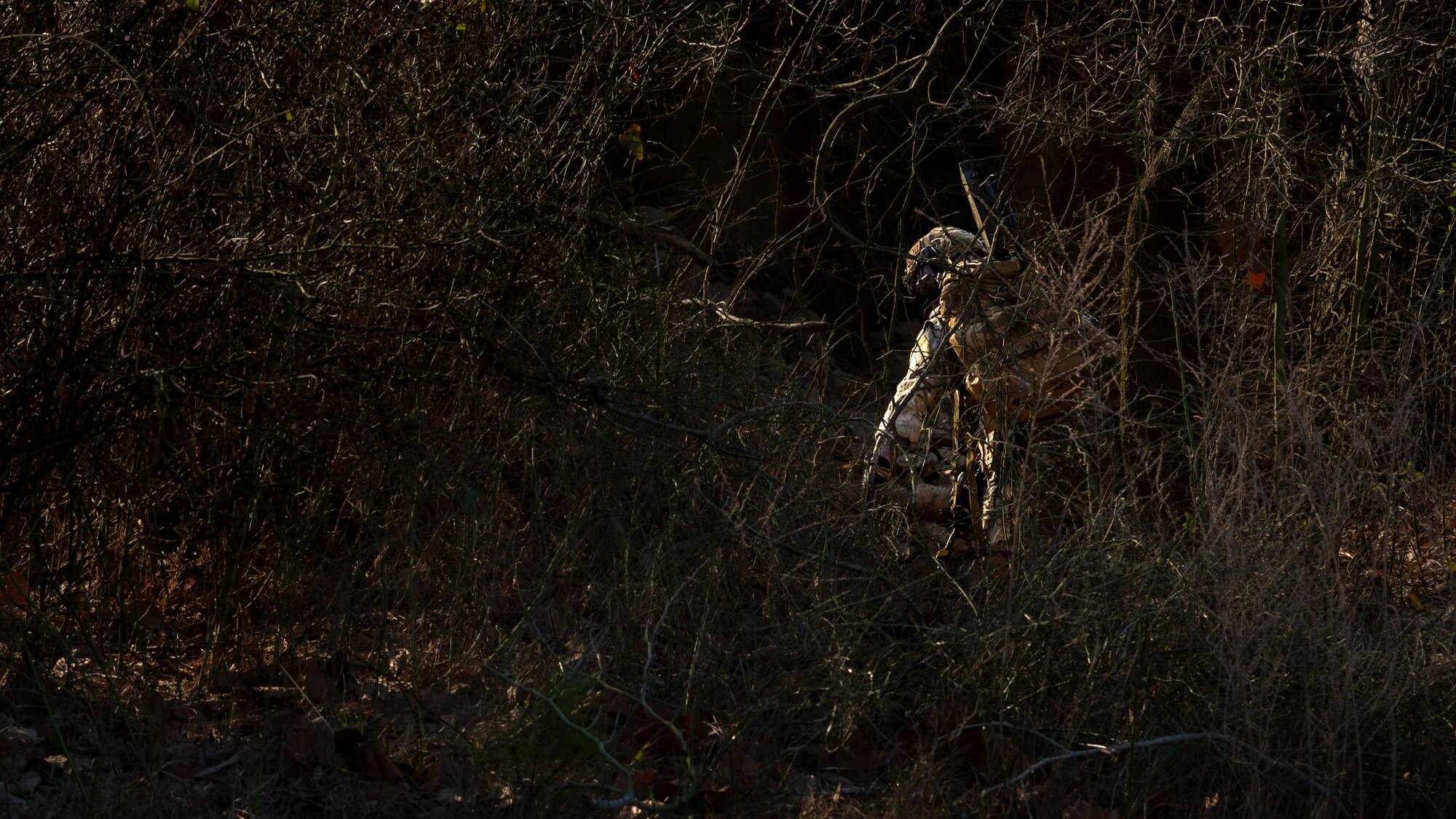 U.S. Air Force Technical Sgt. Adam King, an explosive ordnance disposal team member assigned to the 4th Civil Engineer Squadron, performs a security sweep during a simulated response exercise at Seymour Johnson Air Force Base, North Carolina, Feb. 22, 2024. The training tested the squadron’s ability to properly respond to an aircraft crash under strenuous conditions and brought several different organizations across base together to maximize a realistic atmosphere and maintain security. (U.S. Air Force Photo by Airman 1st Class Rebecca Sirimarco-Lang)