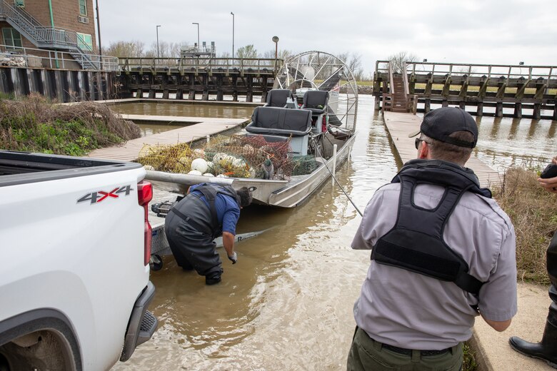 Each year, the Texas Parks and Wildlife Division (TPWD) closes crab fishing with wire mesh crab traps for ten days to give volunteers the opportunity to round up lost and abandoned traps. The closure is traditionally in late February or early March. Unattended traps “ghost fish” and kill blue crabs and other species unnecessarily and can also create a navigation hazard for boaters.
According to a press release from TPWD, since the “Crab Trap Roundup” began 22 years ago, volunteers have removed 42,500 derelict traps, saving an estimated 700,000 blue crabs, a valuable natural resource.
Each year at the Wallisville Lake Project, U.S. Army Corps of Engineers (USACE), Galveston District (SWG) personnel join the Crab Trap Roundup, while they patrol.