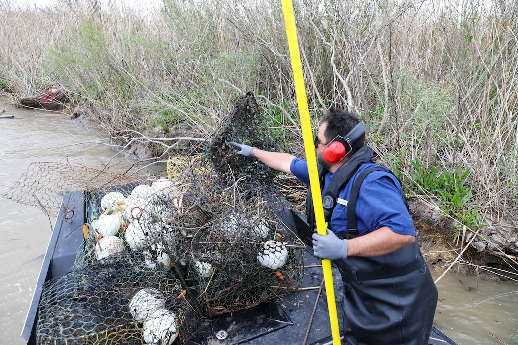 Each year, the Texas Parks and Wildlife Division (TPWD) closes crab fishing with wire mesh crab traps for ten days to give volunteers the opportunity to round up lost and abandoned traps. The closure is traditionally in late February or early March. Unattended traps “ghost fish” and kill blue crabs and other species unnecessarily and can also create a navigation hazard for boaters.
According to a press release from TPWD, since the “Crab Trap Roundup” began 22 years ago, volunteers have removed 42,500 derelict traps, saving an estimated 700,000 blue crabs, a valuable natural resource.
Each year at the Wallisville Lake Project, U.S. Army Corps of Engineers (USACE), Galveston District (SWG) personnel join the Crab Trap Roundup, while they patrol.