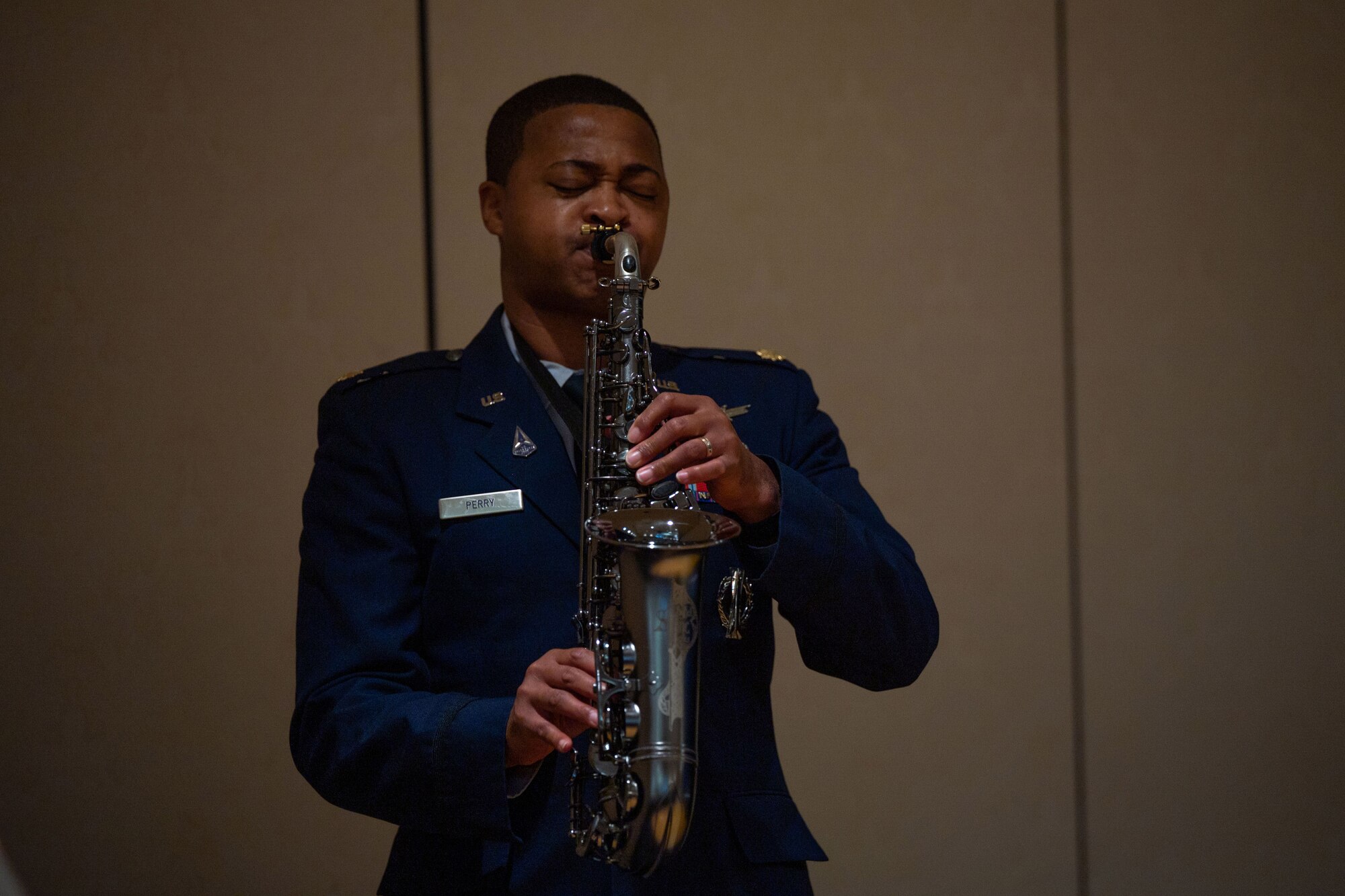 Space Forces- Space financial management division chief, plays the saxophone during United States Space Force Lt. Gen. Doug Schiess, Space Forces—Space and United States Space Command’s Combined Joint Force Space Component commander, promotion ceremony at Vandenberg Space Force Base.