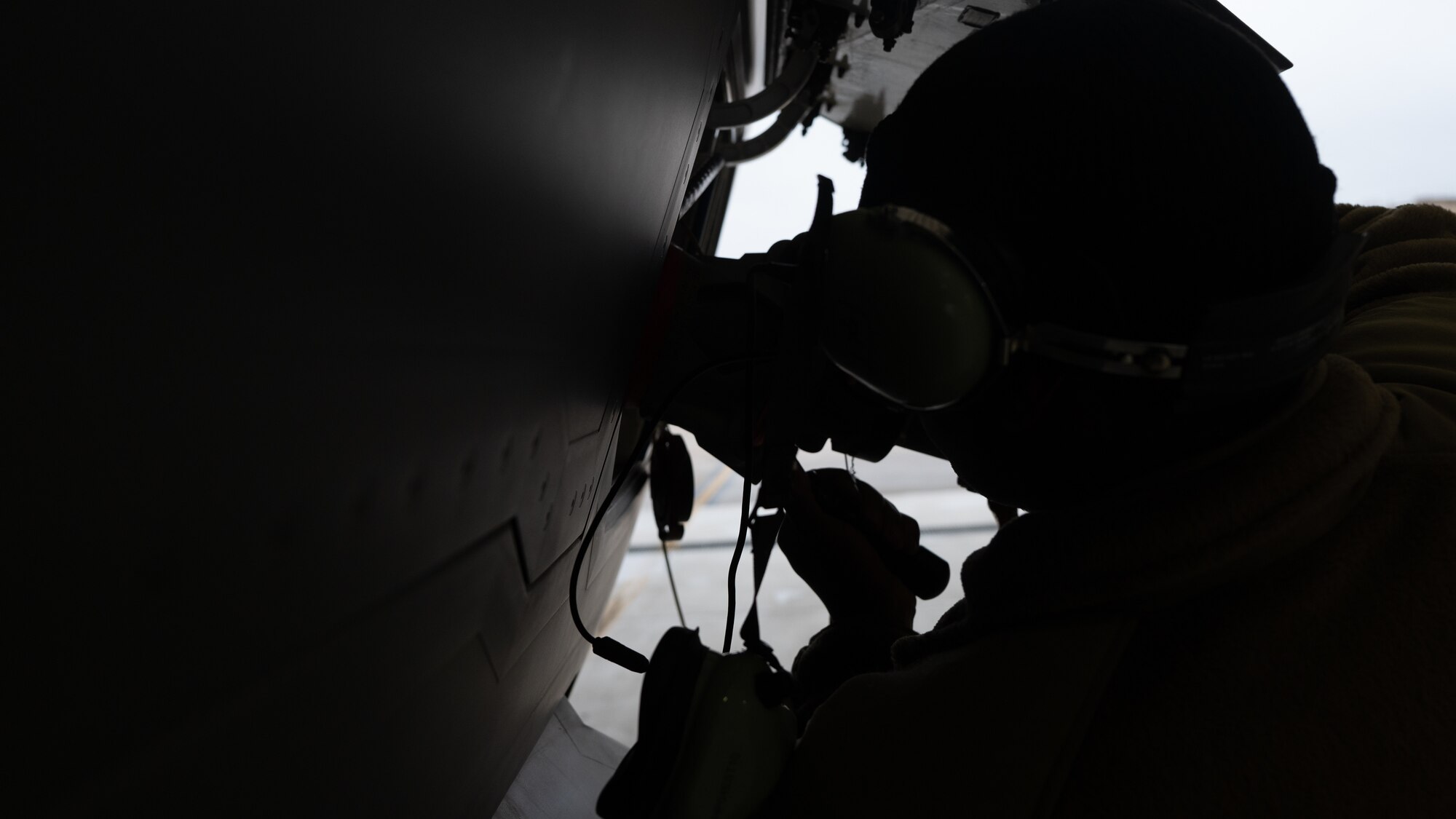 Staff Sgt. Naeem Ghee fastens a fuel hose to a F-35A at Kunsan Air Base.